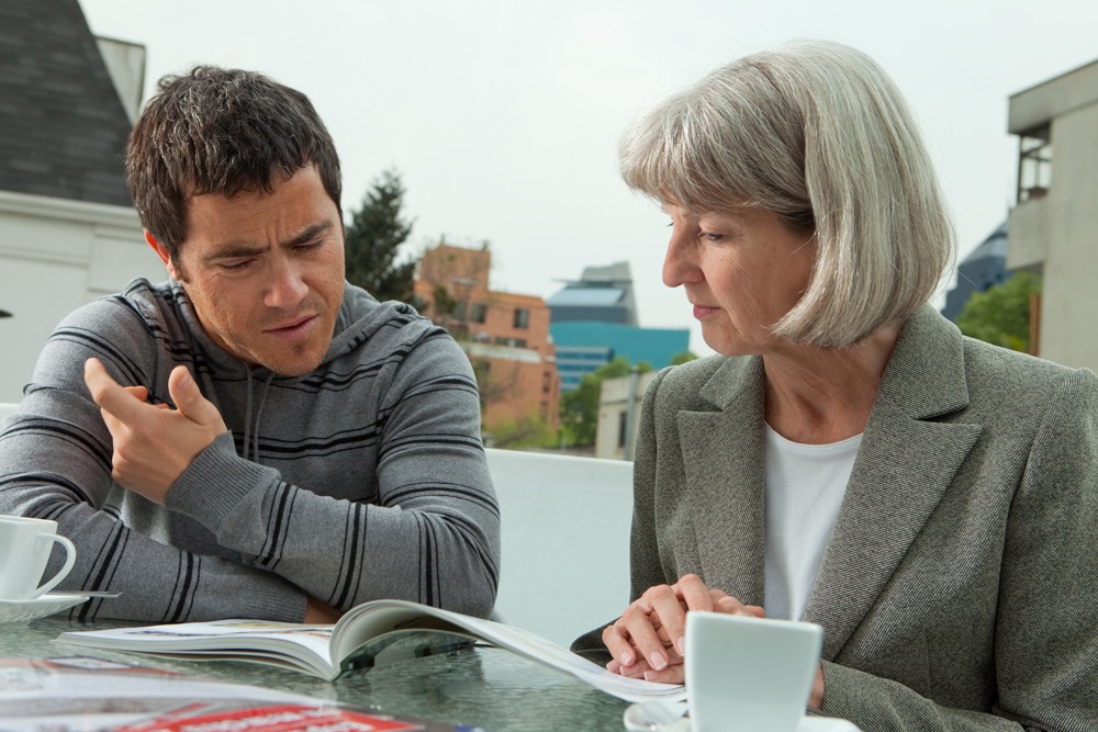 Private tutor working with English student 