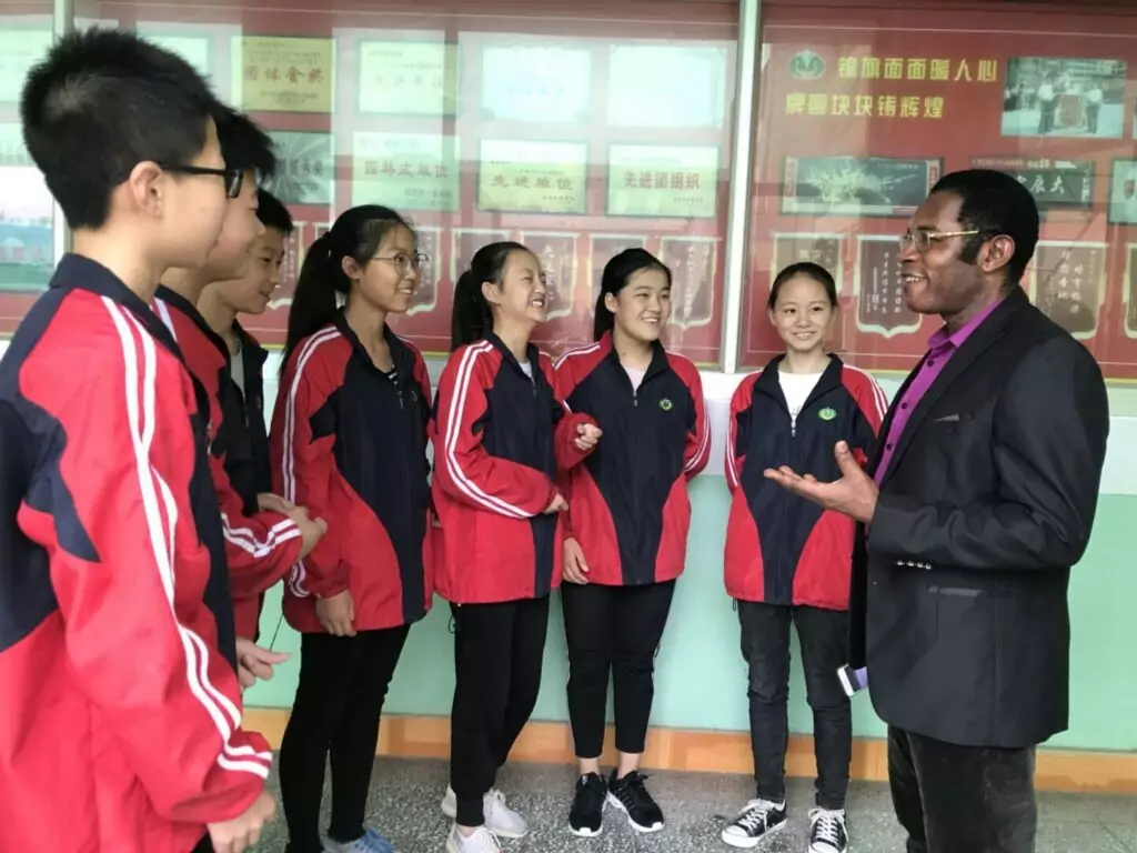 ESL teacher with class of teens