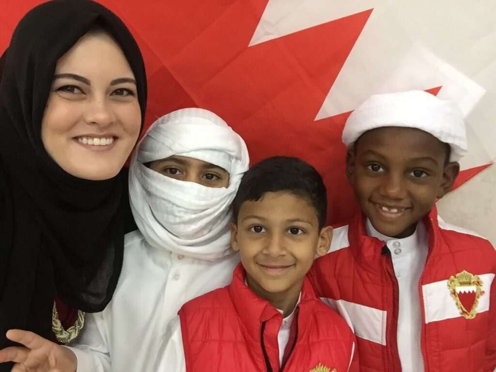 Jasmine, Teacher in Bahrain, with her students