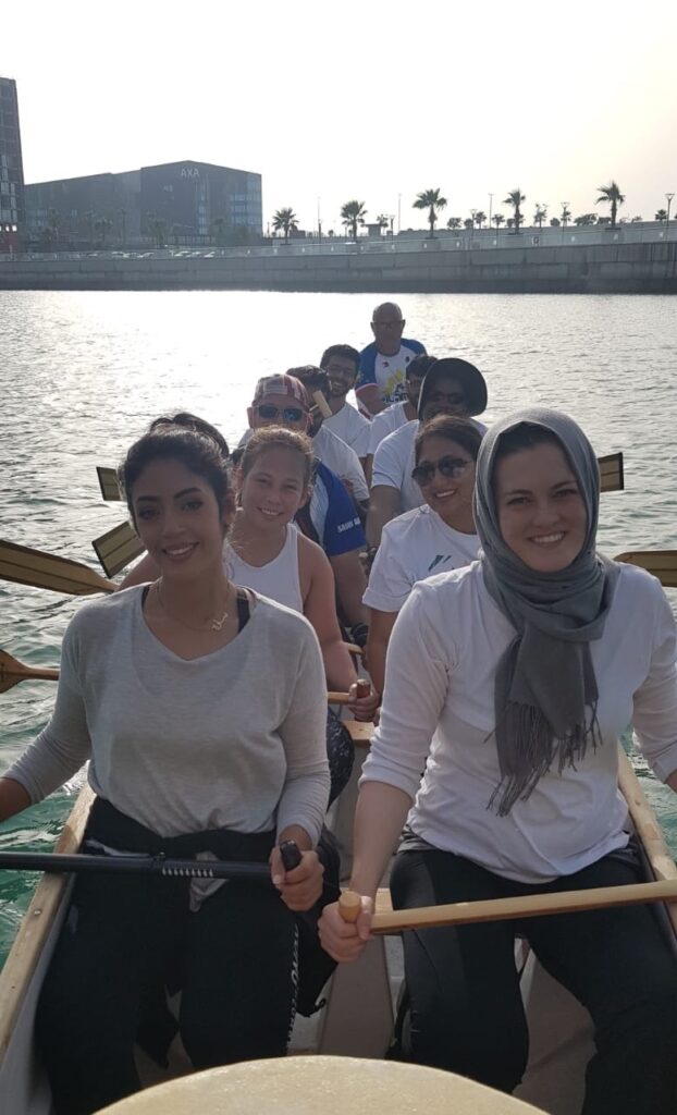 Jasmine, teacher in Bahrain, on a traditional dragon boat 