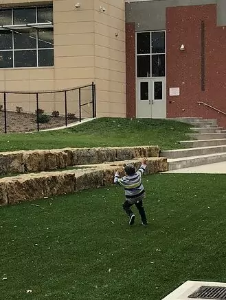 Student from Honduras seeing snow for the first time