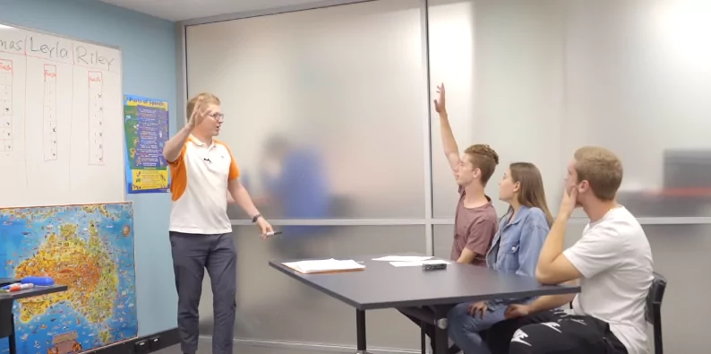Teacher letting learners speak more in class
