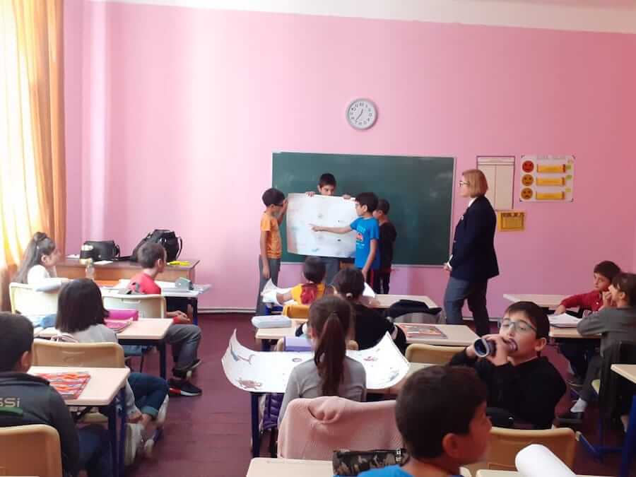 A teacher in Georgia with students