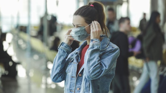 Woman wearing face mask in Asia