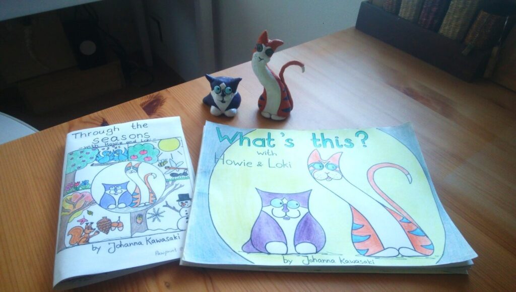 prototypes of Johanna's two EFL learning books and the two characters made out of clay