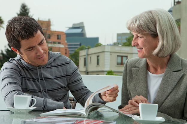 teacher reading with student