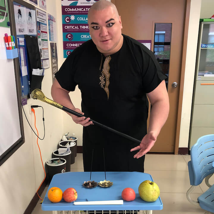 teacher wearing Egyptian costume to teach