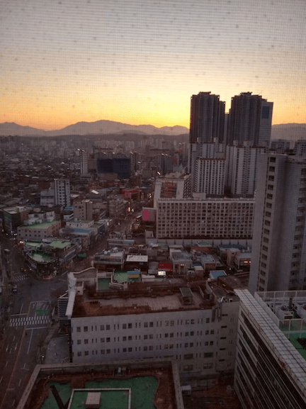 a view of buildings in Seoul from apartment window