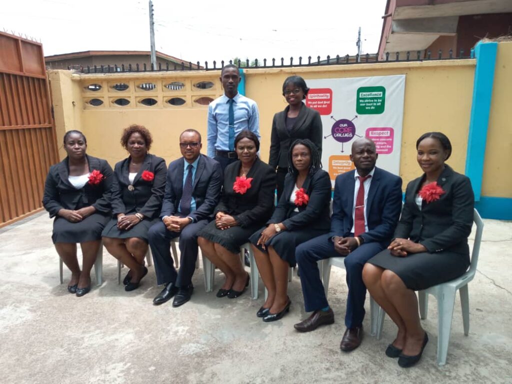 Uchechukwu (third left) with some teacher trainees.