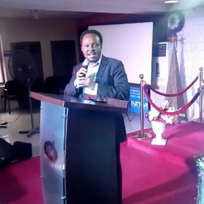 Uchechukwu during a speaking engagement on a book he co-edited