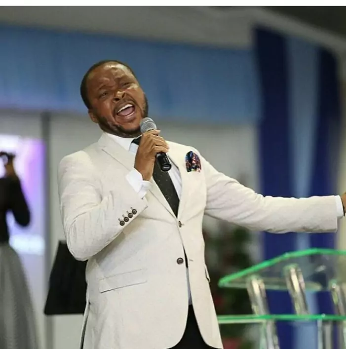 Uche ministering in church