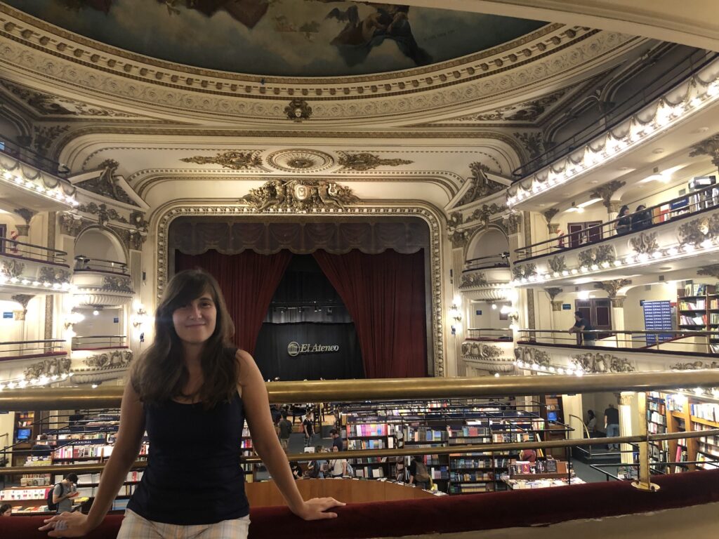 Josefina stands in El Ateneo in Buenos Aires, one of the world's largest libraries.