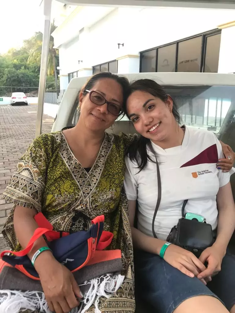 Gabriela (left) with one of her students