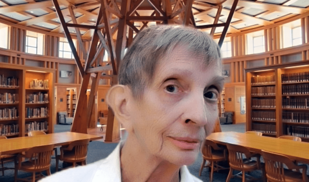 Margaret in a room at the Denver Public library, one of her favorite places to teach online