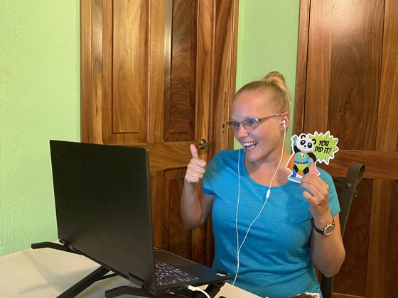 Rachel giving a thumbs up to a student in an online class from her home in Puerto Vallarta, Mexico.
