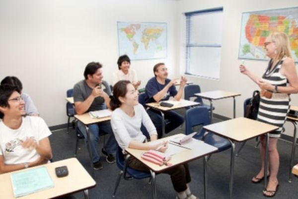 an image of an English teacher using games to teach esl grammar