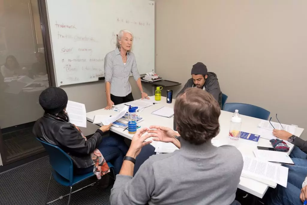 adult ESL students in person classroom