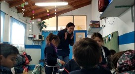 Teacher in classroom in Argentina with young students