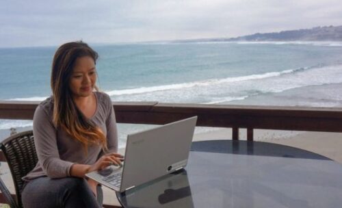 Online English teacher and Bridge alum Krzl Nuñes working from her patio in Chile.