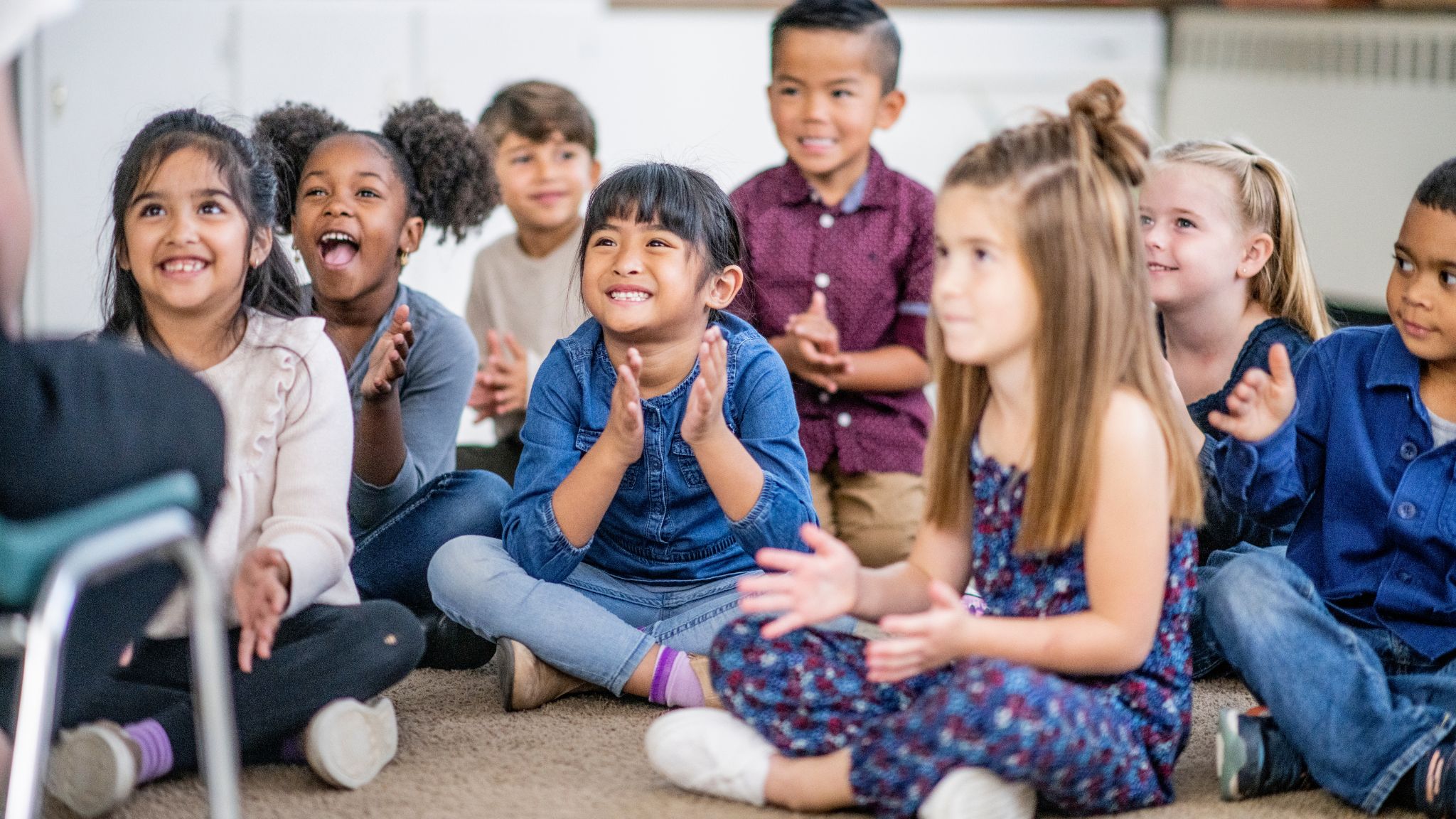 young students play a classroom song game.