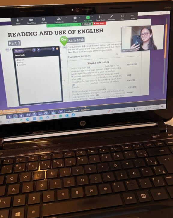 a laptop screen showing an exam task for Carol's test prep course.