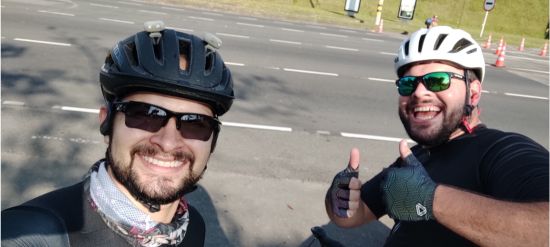 Bridge alum, Luis (left) riding bikes with his brother in Colombia.