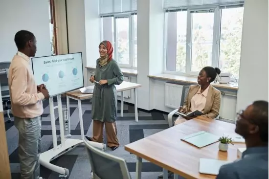 a Business English teacher and student presenting an interactive presentation