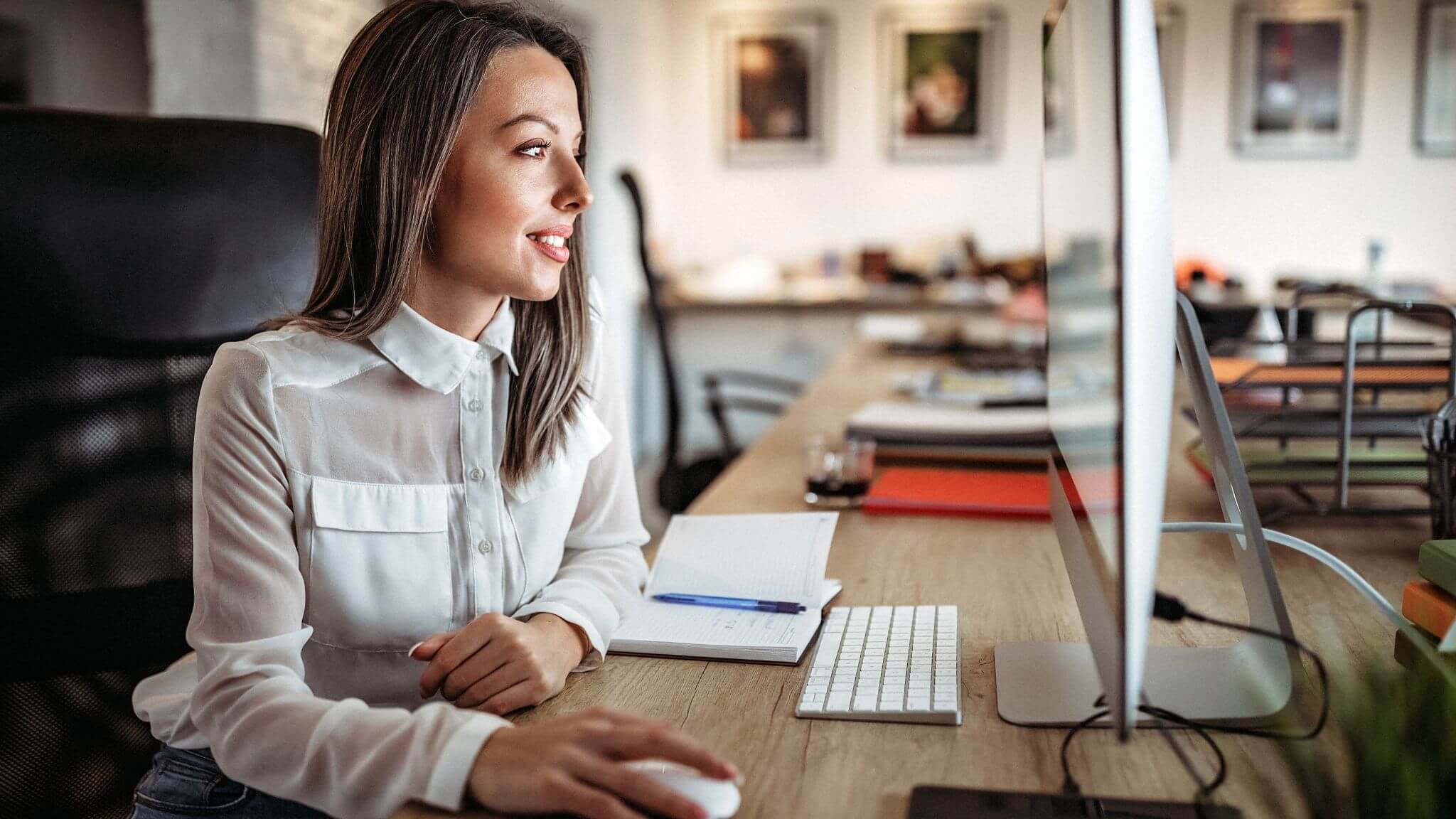 a business woman working online at her desk