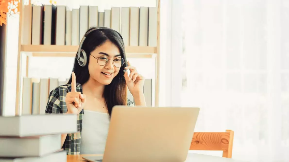 A woman learning English online
