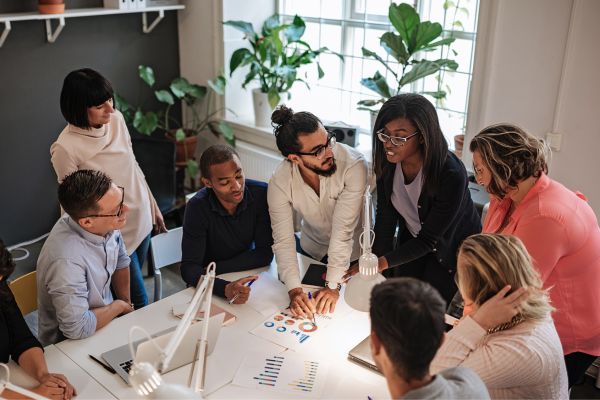 An image of a multi ethnic team having a meeting to work on problem-solving