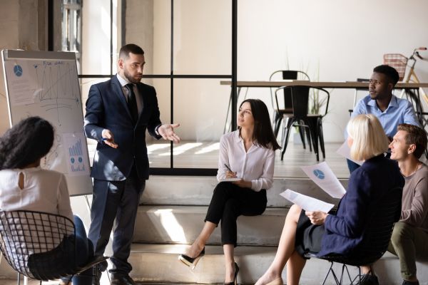 An image of a group of diverse team members having a business meeting