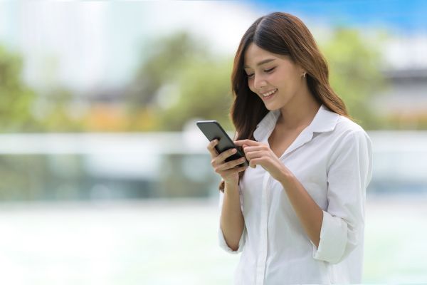 An image of a woman using a mobile phone 