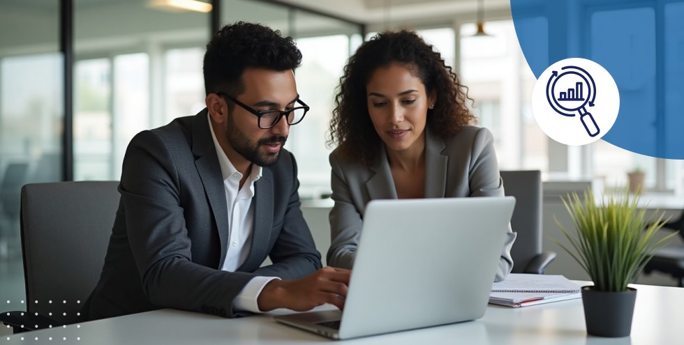 HR professional and business leader reviewing an English training plan together on a laptop.