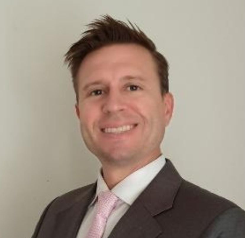 A headshot of professor Sean Dailey.