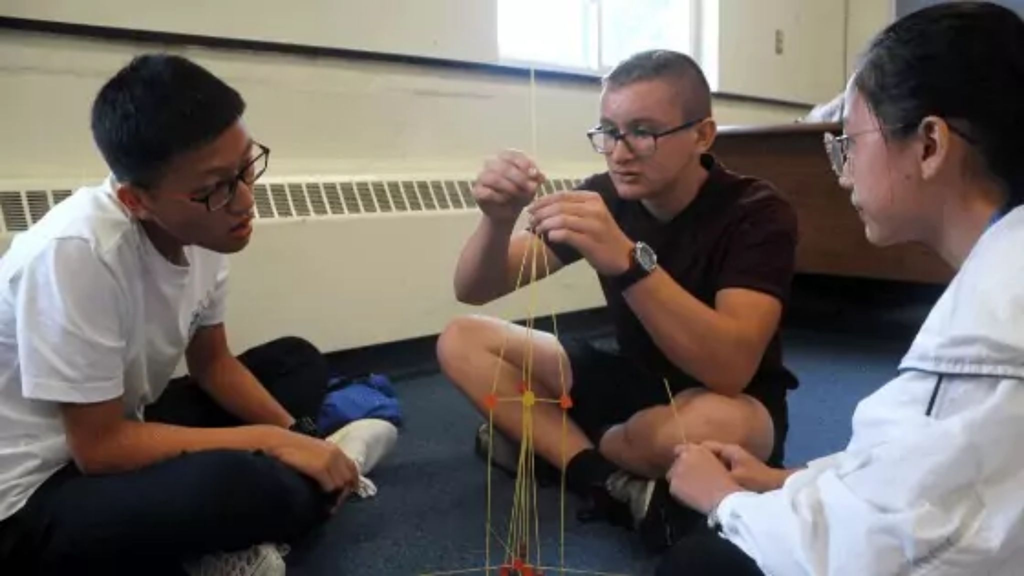 Students in class performing a TBLT task