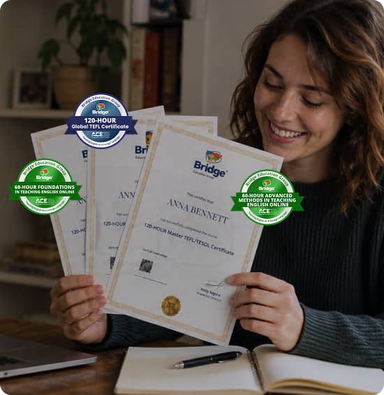 Woman holding Bridge TEFL certificates with digital badges